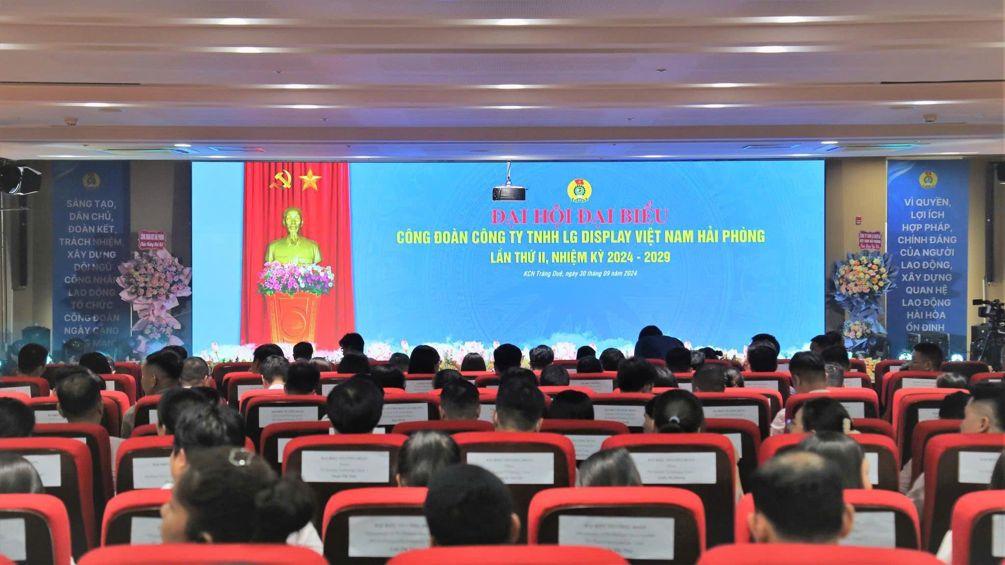 A group of people in a room Description automatically generated