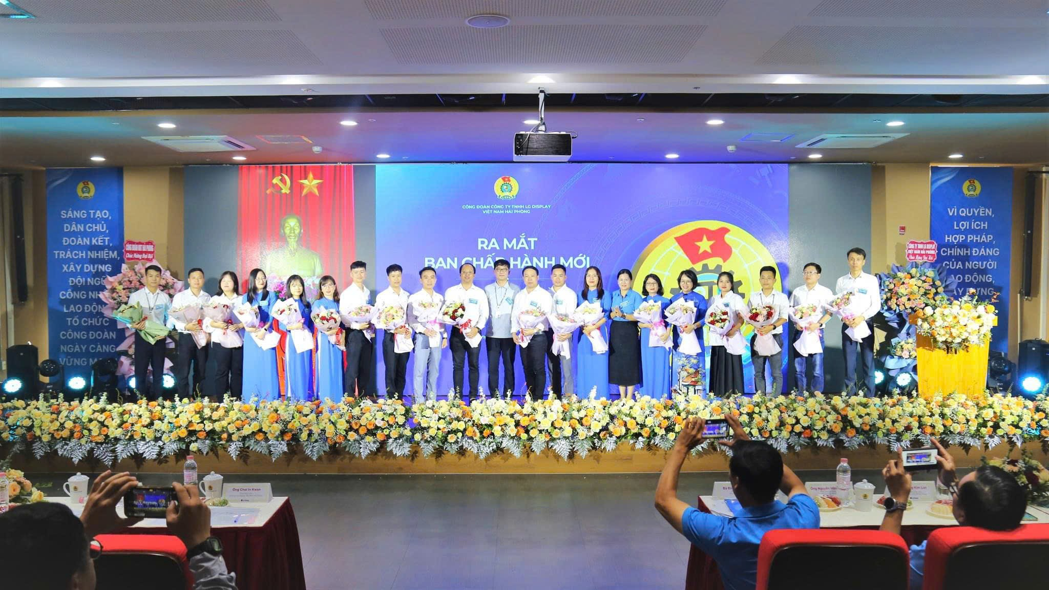 A group of people performing on a stageDescription automatically generated