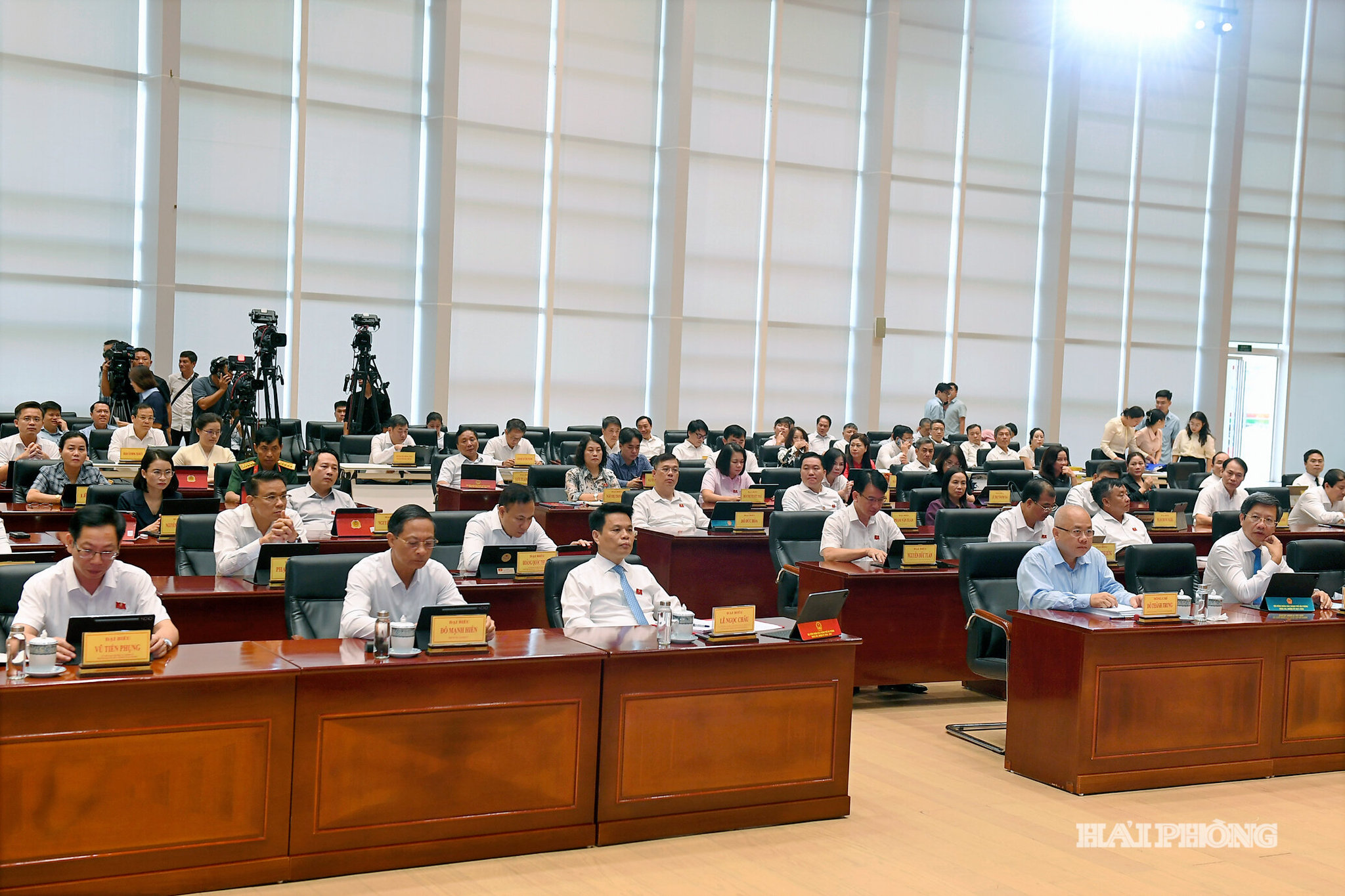 Delegates attend the session.