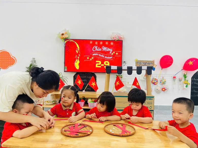 A group of children sitting at a table
AI-generated content may be incorrect.